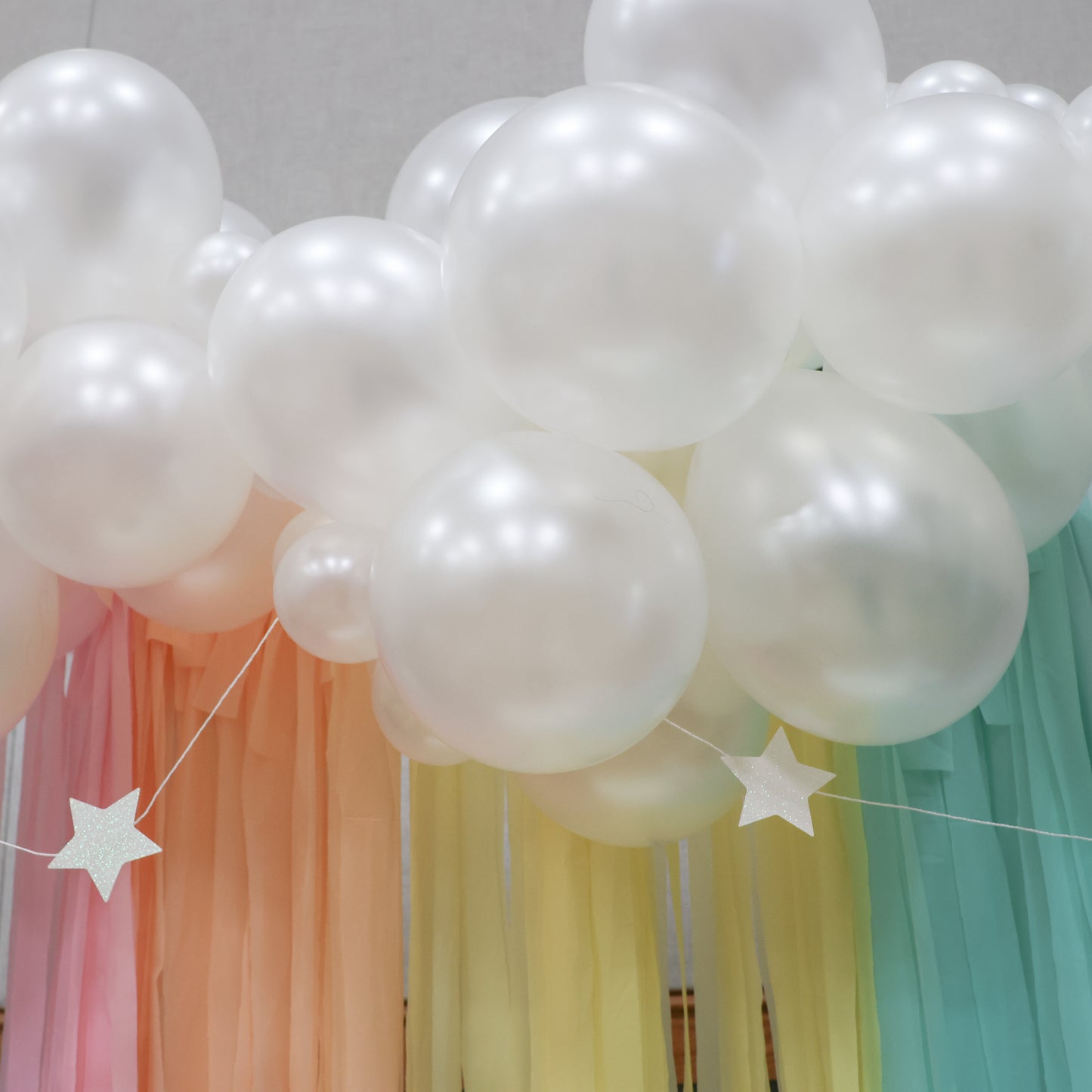 Clouds and Rainbow Streamers Backdrop